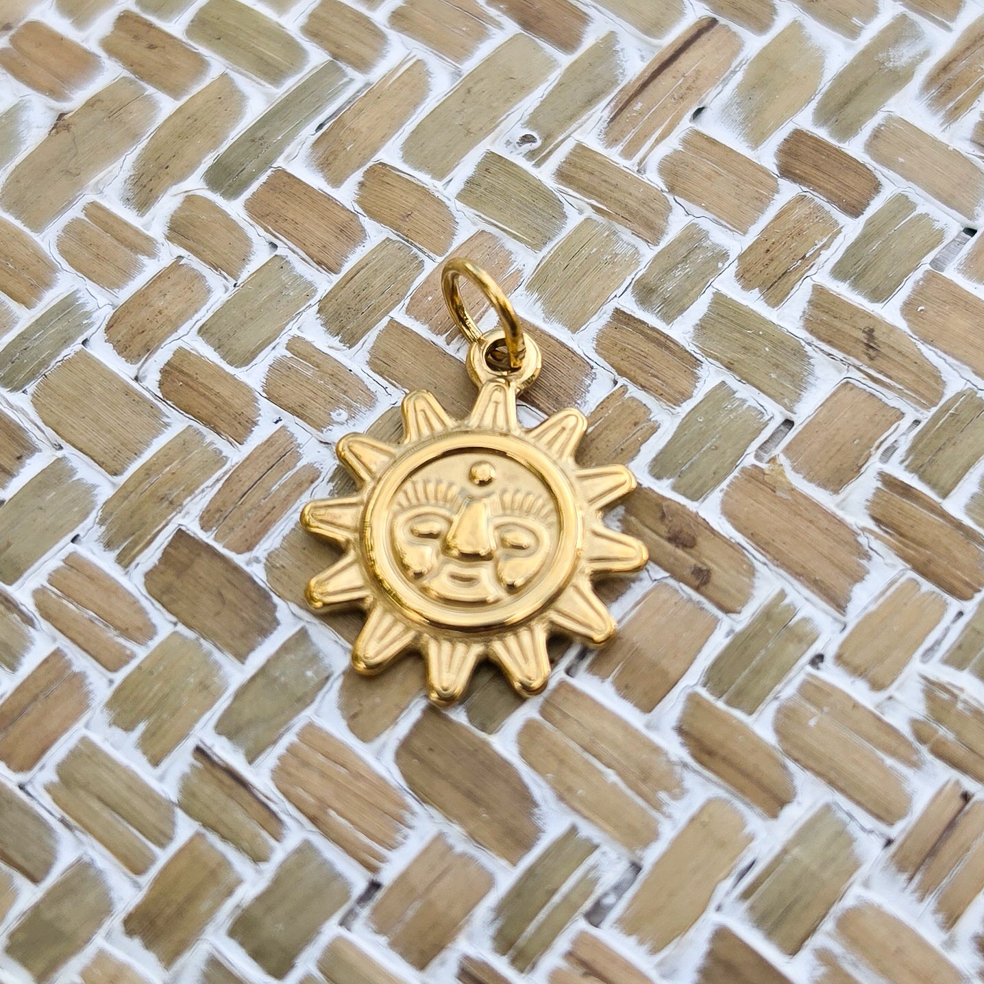 The Gold Sun Charm